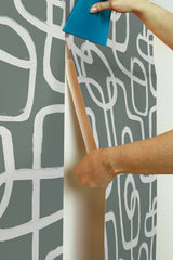 Niko Grey Peel & Stick Wallpaper with Modern Abstract Geometric Looping Motif - NuWallpaper NUS4942