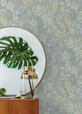 Jesinda Green Peel and Stick Wallpaper with Muted Botanical Florals and Varied Tropical Leaves in Soft Green and Blue Tones by NuWallpaper - NUS6426