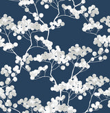 Cyprus Blossom peel and stick wallpaper with gray-white blossoms and branches on a navy blue background