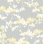 Cyprus Blossom peel and stick wallpaper in buttercup yellow and white blossoms on a gray ground