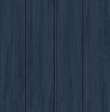 Naval blue wood panel peel and stick wallpaper with vertical planks
