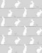 Daydream grey peel and stick wallpaper with white bunny silhouettes in a repeating pattern.