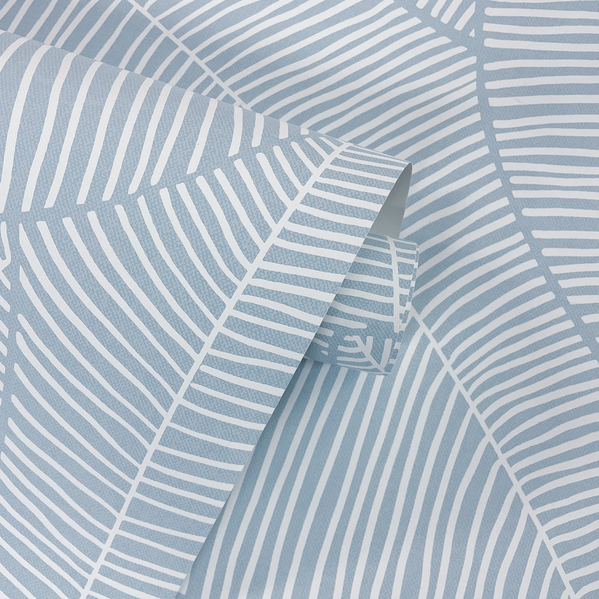 Summer Magnolia Blue Skies by NextWall Peel & Stick Botanical Leaf Peel & Stick Wallpaper – NextWall NW47502