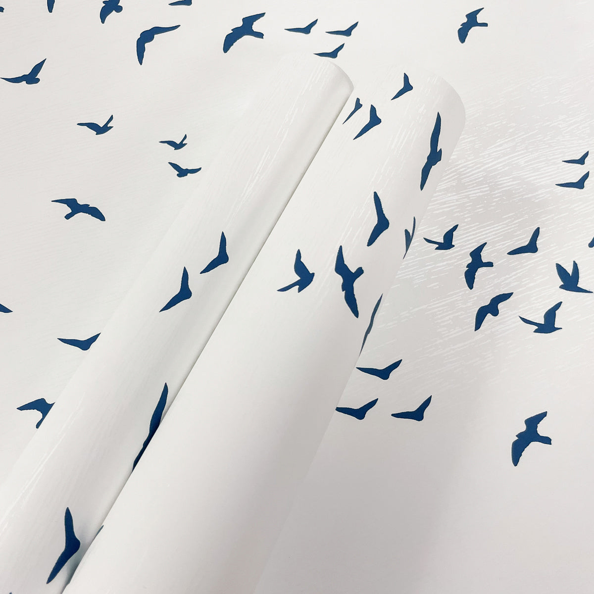 Birds in Flight Navy Blue by NextWall Peel & Stick Bird Silhouette Wallpaper – NextWall NW47602