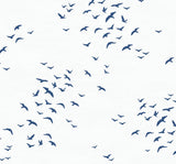 Birds in Flight peel and stick wallpaper in navy blue bird silhouettes on a white background