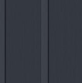 Dark blue faux board and batten prepasted wallpaper with vertical panel detailing.