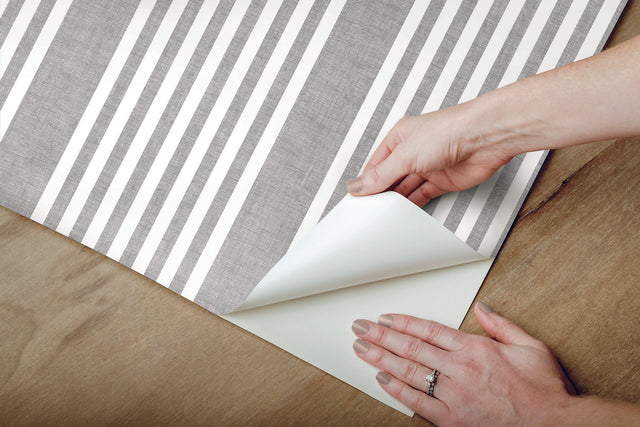 French Linen Stripe Grey Peel & Stick Wallpaper with Linen-Textured Stripe Motif - York PSW1133RL