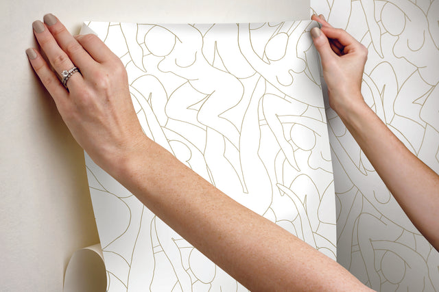 Head over Heels Gold Metallic Peel & Stick Wallpaper with Line Art Figure Motif - York PSW1257RL