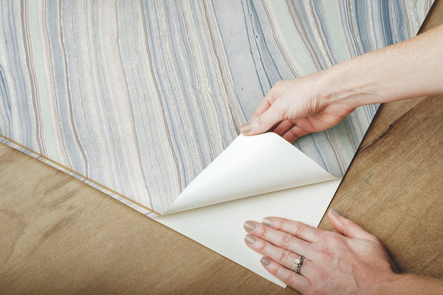 Onyx Strata Mist Blue Premium Peel & Stick Wallpaper with Geometric Stone Vein Motif - York PSW1421RL