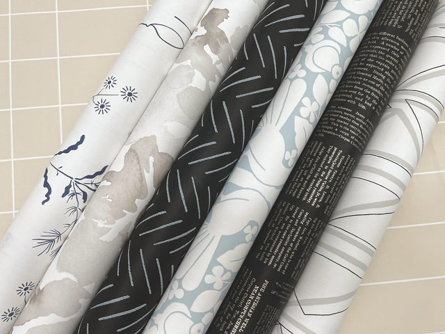Pick Up Sticks Black Peel & Stick Non Woven Wallpaper with Bohemian Herringbone Stripe - York PSW1488RL