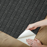 Pick Up Sticks Black Peel & Stick Non Woven Wallpaper with Bohemian Herringbone Stripe - York PSW1488RL