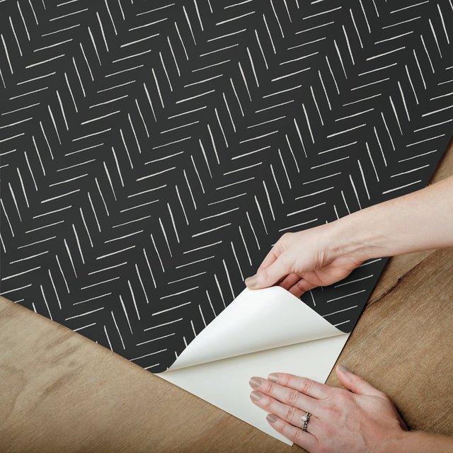 Pick Up Sticks Black Peel & Stick Non Woven Wallpaper with Bohemian Herringbone Stripe - York PSW1488RL