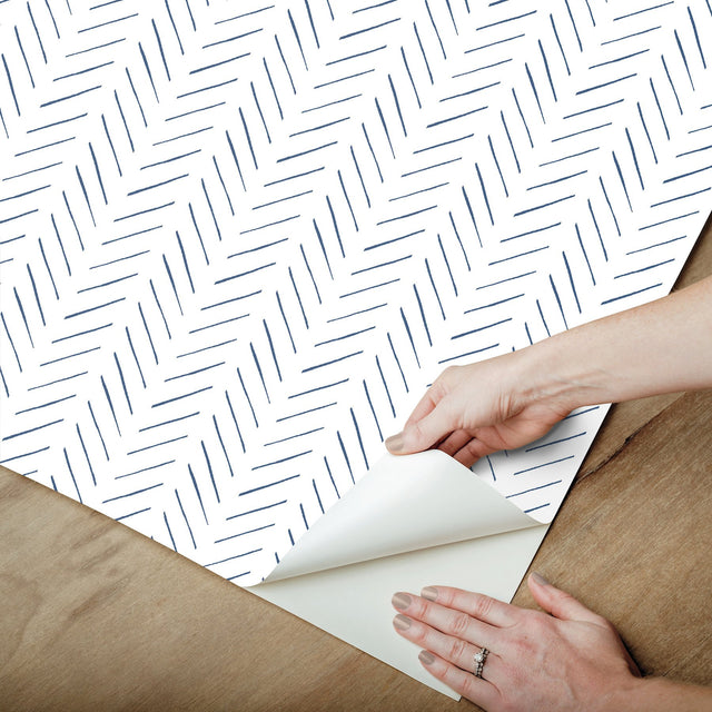 Pick Up Sticks Navy Peel & Stick Wallpaper with Bohemian Herringbone Stripe - York PSW1489RL