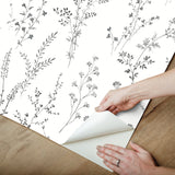Wildflower Sprigs Black & White Peel & Stick Wallpaper with Botanical Watercolor Sprigs - York PSW1522RL