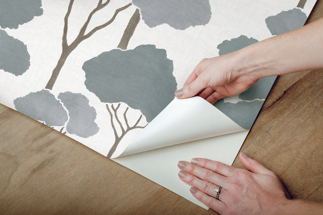 Umbrella Pines Blue Peel & Stick Wallpaper with Whimsical Botanical Trees Pattern - York RMK12063WP
