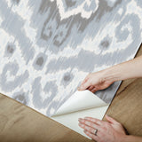Bohemian Ikat Grey Peel & Stick Wallpaper with Botanical Leaves Pattern, Tropical Style - York RMK12250PLW