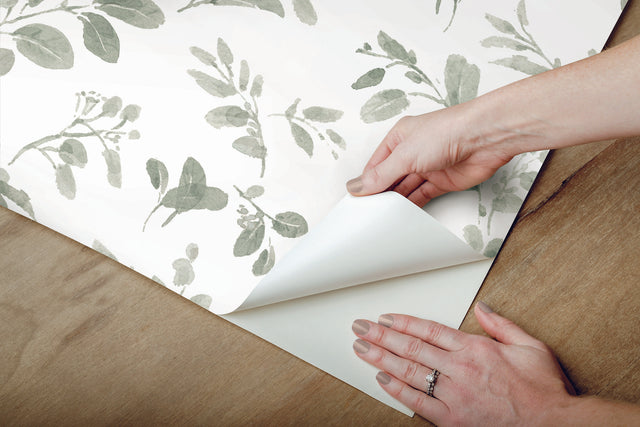 Dancing Leaves Green Peel & Stick Wallpaper with Whimsical Botanical Floral Pattern - York RMK12274PL