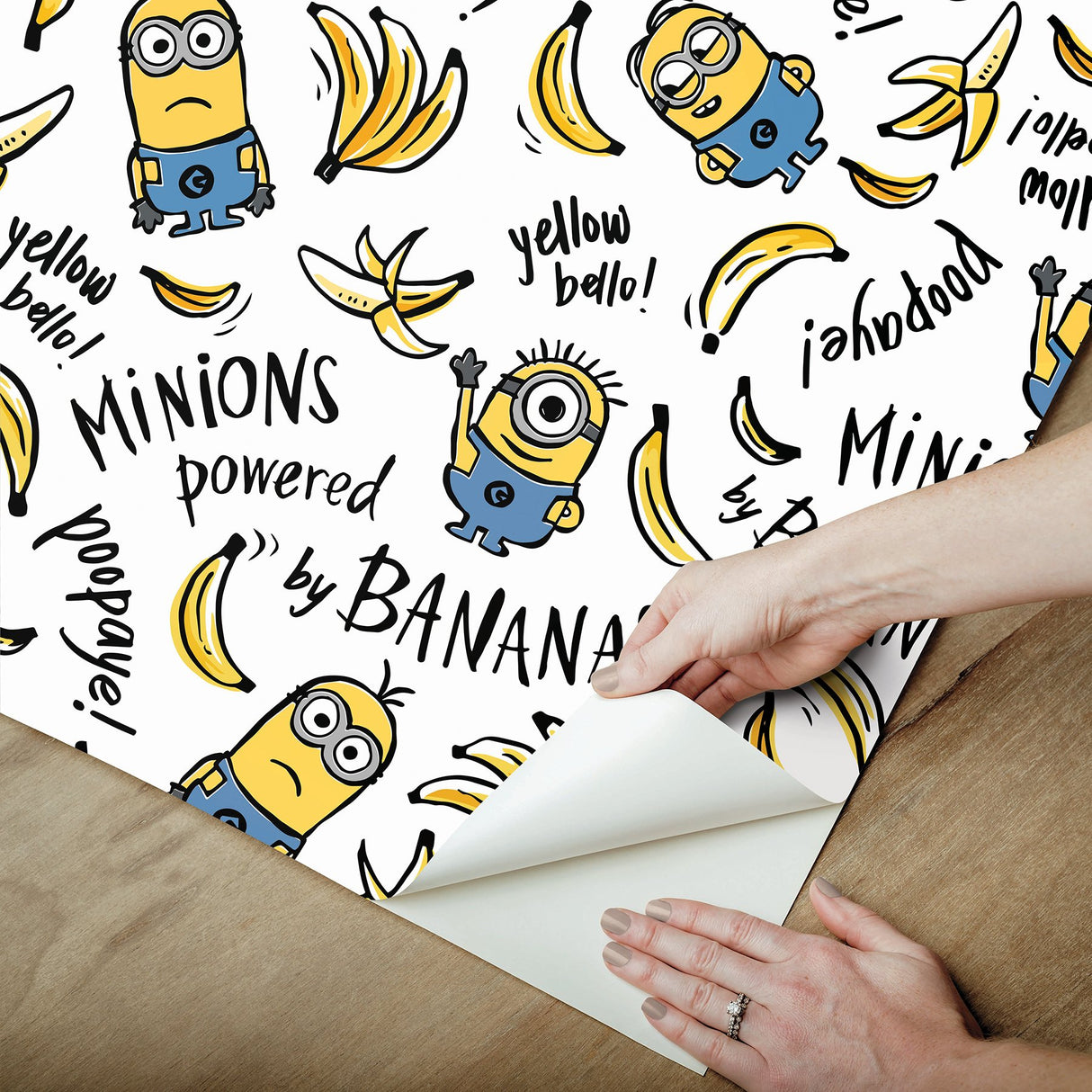 Minions Powered By Bananas White Peel & Stick Wallpaper with Novelty Graphics - York RMK12729PLW