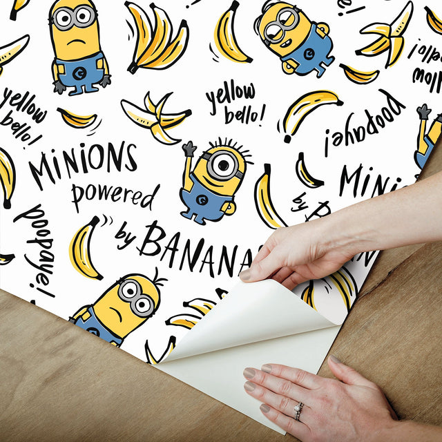 Minions Powered By Bananas White Peel & Stick Wallpaper with Novelty Graphics - York RMK12729PLW