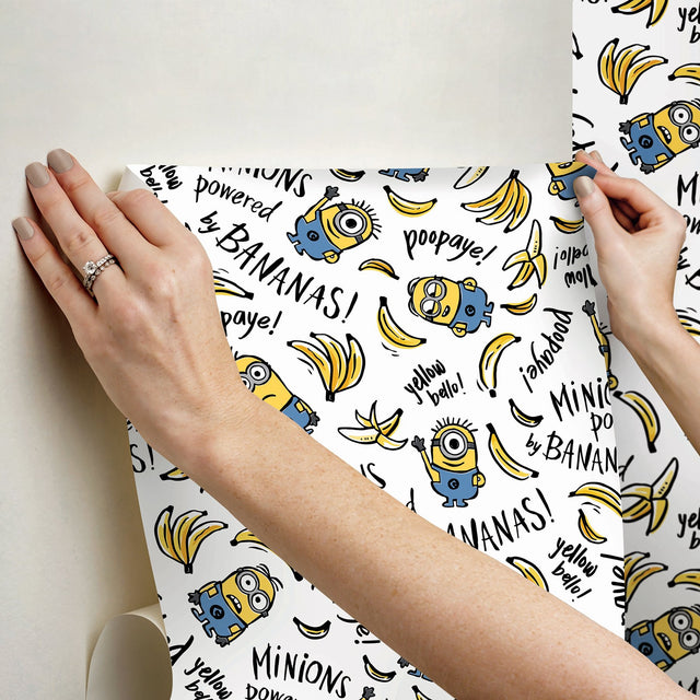 Minions Powered By Bananas White Peel & Stick Wallpaper with Novelty Graphics - York RMK12729PLW