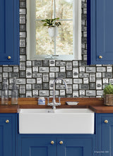 The Perfect Match Black Peel and Stick Whimsical Nautical Matchbox Collage Black and White Wallpaper by RoomMates - RMWS1280