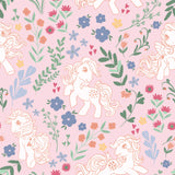 My Little Pony Retro Floral Pink Peel and Stick Wallpaper featuring retro ponies prancing among colorful flowers, hearts and botanicals on a soft pink background by RoomMates RMWS1344