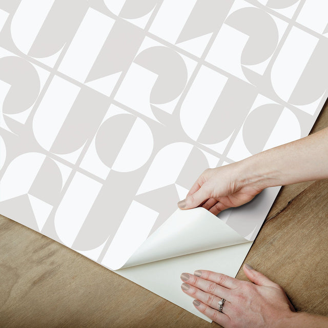 RuDeco Ghost Grey Peel & Stick Wallpaper with Art Deco Geometric Lettering - NuWallpaper RPS6140