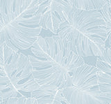 Light blue botanical wallpaper with white monstera leaf outlines