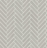 Herringbone Inlay Warm Stone and Metallic Pearl peel and stick wallpaper with a metallic herringbone tile pattern.