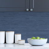 Seagrass Indigo Peel and Stick Self Adhesive Vinyl Wallpaper with Coastal Grasscloth Texture in Rich Blue Tones by NuWallpaper - SLW3410