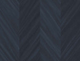 Chevron Wood wallpaper in Baikal blue with a matte, textured chevron woodgrain effect.