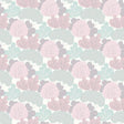 Little Woods Blush non-woven wallpaper roll with whimsical trees pattern in pink and mint