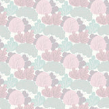 Little Woods Blush non-woven wallpaper roll with whimsical trees pattern in pink and mint